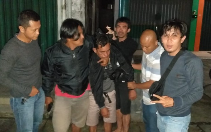Pelaku saat diamankan polisi
