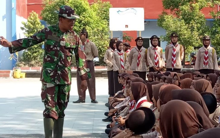  Satgas TMMD Suluh Wasbang  Kepada Pramuka