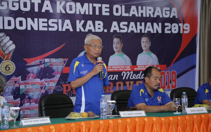 Plt Bupati Asahan Surya saat menghadiri rapat KONI