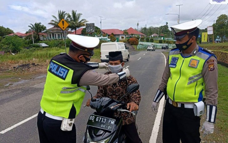 Peran Polisi Cegah Penyebaran Covid-19