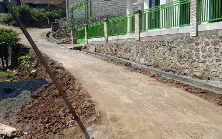 Drainase Baru Karya Satgas TMMD 112 Membentang di Sepanjang Jalan Desa Tulungrejo