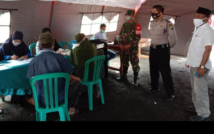 Satgas TMMD 112 Lakukan Pengamanan Vaksinasi 