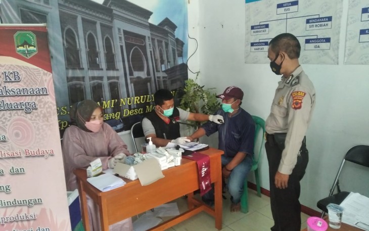 Kanit Binmas Polsek Cingambul Ajak Warga Pelaksanaan Percepatan Vaksinasi Nasional 