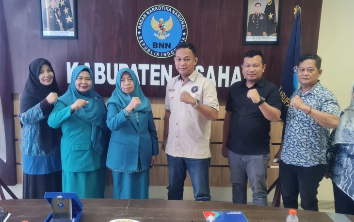 TP PKK Kabupaten Asahan dan BNNK Asahan saat Tanda Tangani Nota Kesepahaman
