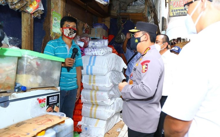 Kapolri Jenderal Listyo Sigit Prabowo saat meninjau migor di Pasar Minggu, Jakarta Selatan, Senin (21/3/2022).