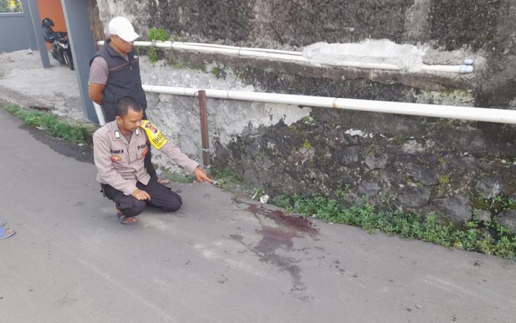 Polisi saat Lakukan Penyelidikan