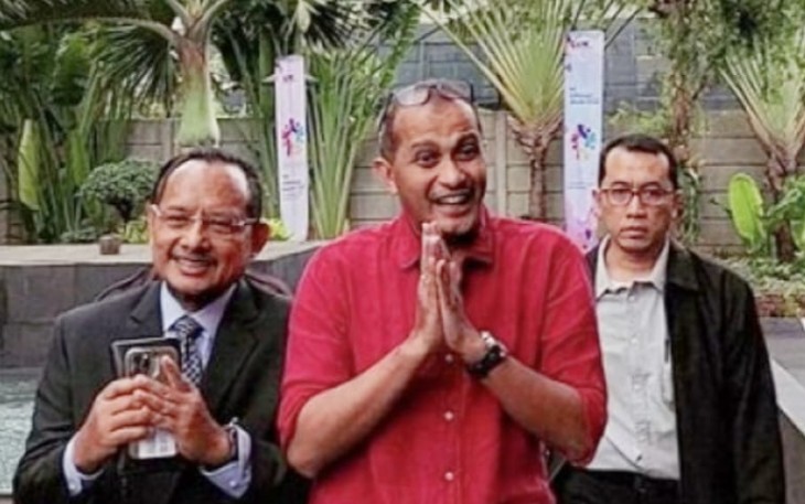 Wamenkumham, Edward Omar Sharif Hiariej alias Eddy Hiariej (baju merah).