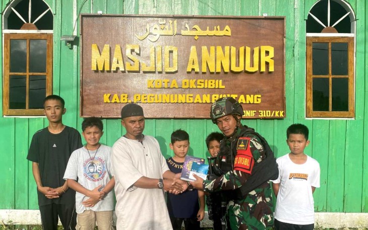 Papan Masjid Karya Prajurit Satgas Yonif 310/KK