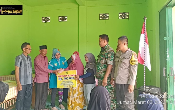 Bhabinkamtibmas Monitoring Penyaluran BLT-DD Desa Suka Raja