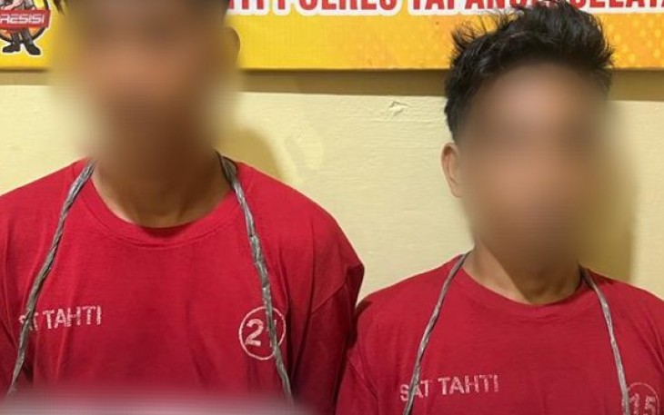 Kedua Tersangka saat diamankan di Polres Tapsel