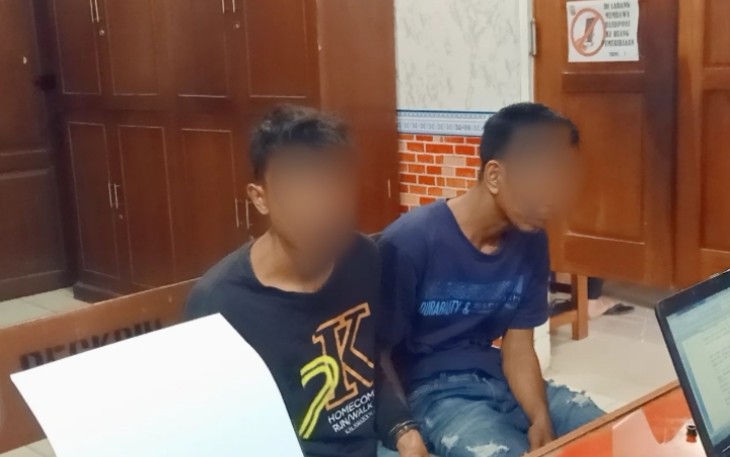 Dua tersangka saat diamankan