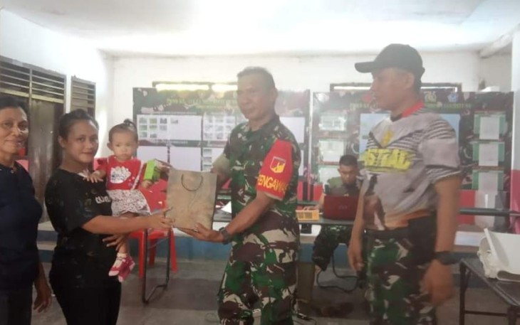 Satgas TMMD Ke-116 Kodim 1310/Bitung berikann bantuan Susu dan Vitamin kepada anak-anak