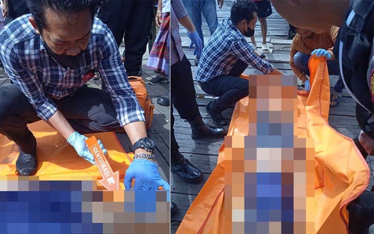 Petugas saat identifikasi mayat