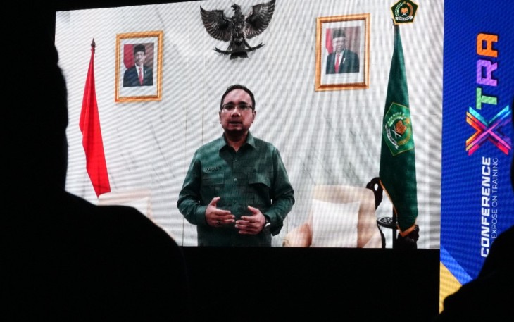 Menteri Agama Yaqut Cholil Qoumas saat memberikan arahan melalui video pada Conference Xtra di Surabaya, Selasa (13/8/2024).