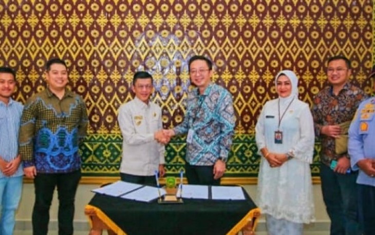 Pj Wali Kota Hasan Tandatangani Kerjasama Penggunaan Fuel Card KB Bank