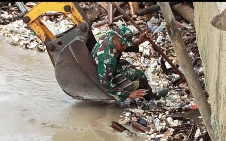 TNI Dalam Upaya Penanganan Bencana Banjir Provinsi Jambi