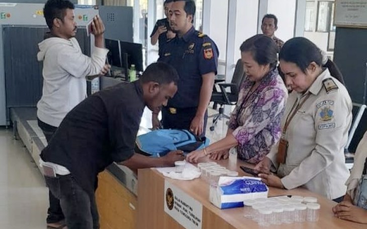 Pemerikasaan urine pelintas batas
