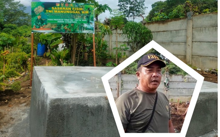 Serma Bonny Katuuk saat memberikan penjelasan di lokasi pembangunan bak air kelurahan Girian Permai