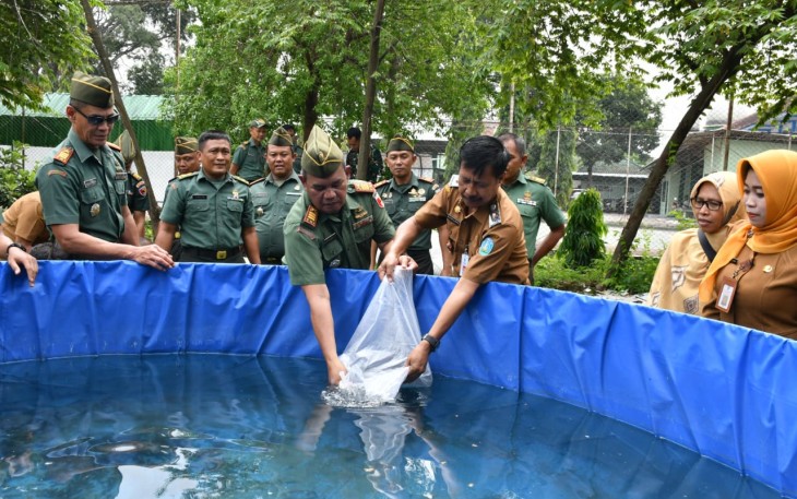 Kodim Ponorogo Wujudkan Ketahanan Pangan Dengan Tabur Benih Ikan Lele