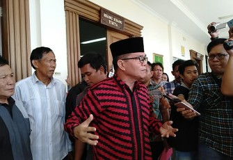 Dirwan Mahmud usai menjalani sidang tuntutan