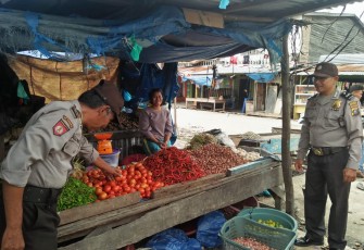 Polsek Panai Hilir Sampaikan Pesan Kamtibmas ke pedagang pasar 
