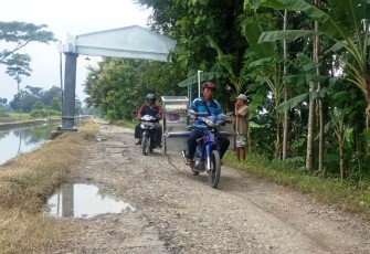Mereka Yang Diuntungkan Dengan Pembangunan "Jalan TMMD"