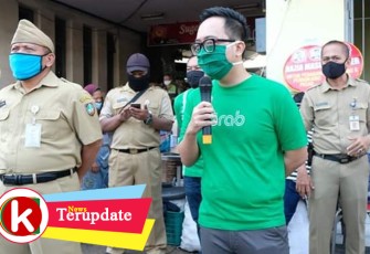 Sosialisasi peluncuran fitur aplikasi belanja online Grab Assistant di salah satu pasar tradisional di Kota Solo Jawa Tengah.