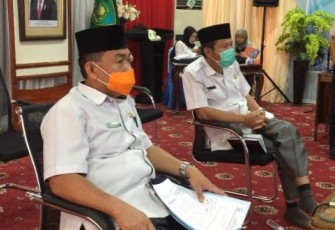 Asisten III M Husni Saat Mengikuti Rakor  Penanganan Dampak Virus Corona 