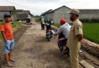 Kegiatan Padat Karya Tunai Pembangunan Peningkatan Pengerasan Jalan Desa