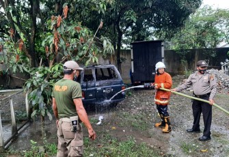 Panther Mendadak Terbakar di Garasi Mobil Yu Tjoe Tong 