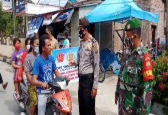Wakapolsek Bandar Khalipah Pimpin Operasi Yustisi di Desa Khalipah