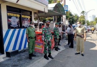 Sinergitas TNI - Polri dan Satlinmas dalam penanganan, pengendalian Corona Virus Disease 19 Di Masyarakat, Senin (12/04/2021) 