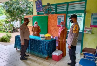 Kapolsek Pantau Vaksin Sinovac di UPT Puskesmas Dolok Merawan