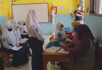 UPT PKM Wado Besama Forkopimcam Wado Gelar Vaksinasi Untuk Pelajar SMPN 1 