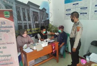 Kanit Binmas Polsek Cingambul Ajak Warga Pelaksanaan Percepatan Vaksinasi Nasional 