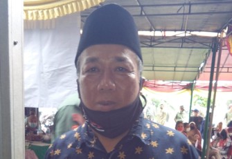 Ketua RW setempat Nasam