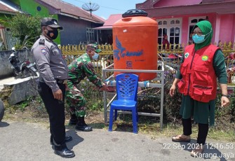 Bhabinkamtibmas Polsek Curup Tinjau Prokes di Lokasi Hajatan