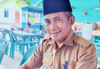Kepala Desa Pengujan Zulfitri