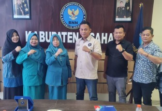 TP PKK Kabupaten Asahan dan BNNK Asahan saat Tanda Tangani Nota Kesepahaman