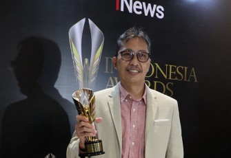 Dirut Bank Jatim Busrul Iman setelah menerima pengharagaan di Jakarta (26/10/22).