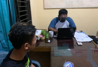 Terduga Pelaku saat diperiksa penyidik