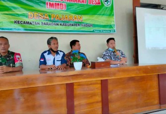 Sertu Muhammad saat menghadiri musyawarah desa