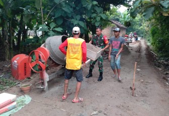 Rabat jalan desa bersama warga masyarakat 