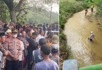 Petugas dibantu warga sedang melakukan pencarian satu orang korban terseret banjir di sungai kecamatan Todanan.