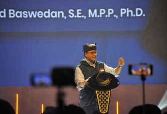  Anies Baswedan dalam Simfoni Kebangsaan yang digelar di Dyandra Convention Center, Surabaya, Jumat (17/3/2023) kemarin. 