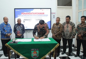 Penandatanganan NPHD Antara Pemerintah Daerah Kabupaten Asahan dengan KPU Kabupaten Asahan