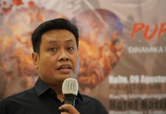 Pengamat Surabaya Survey Center Iksan Rosidi