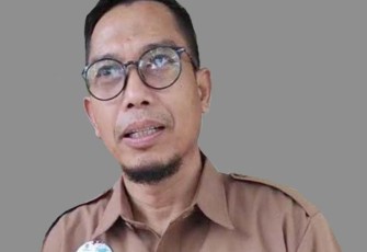 Saniran, Plt Kepala Diskomindag Kabupaten Trenggalek, saat dikonfirmasi, Selasa (7/3/2023) (Foto Hardi Rangga klikwarta.com).