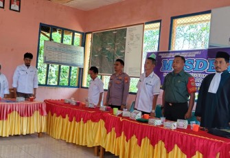 Kapolsek Lebong Atas Hadiri Pelantikan Perangkat Desa Sukau Datang I