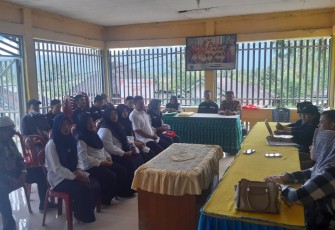 Bhabinkamtibmas Polsek Lebong Utara Hadiri Rapat Pleno Terbuka Rekapitulasi DPHP di Desa Tunggang